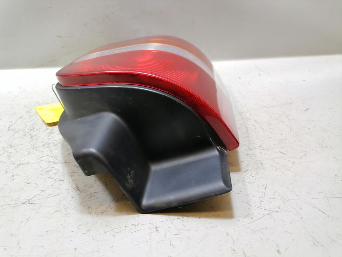 Volkswagen T5 original R&uuml;cklicht R&uuml;ckleuchte Schlussleuchte links f&uuml;r Fl&uuml;gelt&uuml;ren Bj.2004